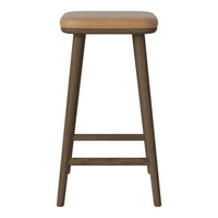 Tan upholstered seat on a dark wooden stool, showcasing a sleek, minimalist design.