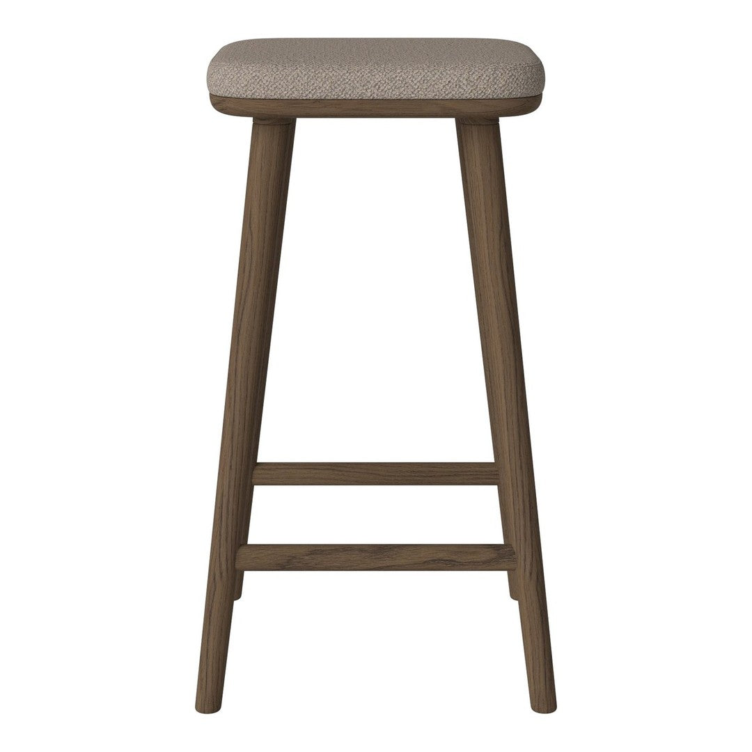 Light beige upholstered stool with dark wooden legs, featuring a simple, modern design and smooth finish.