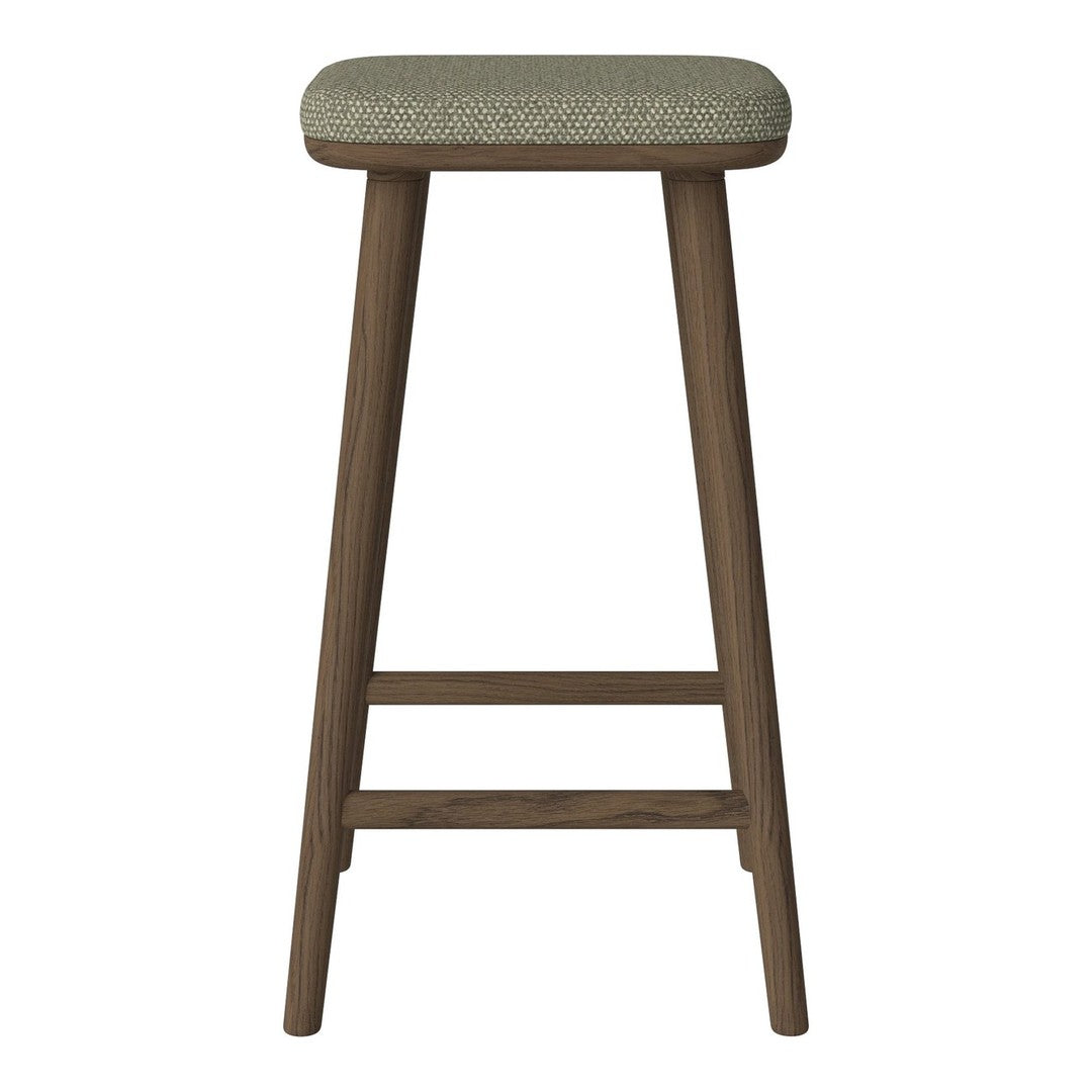 Brown wooden bar stool with a textured green fabric seat. Simple, modern design with a natural aesthetic.