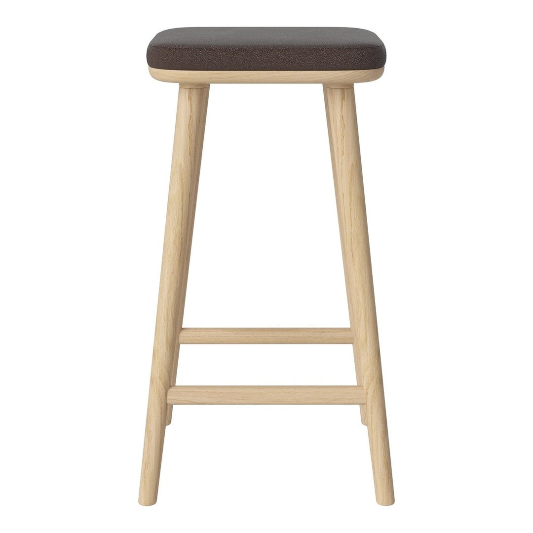Tall bar stool with a dark wood top and light natural wood legs, showcasing a minimalist design.