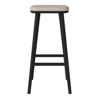 Black wooden bar stool with a light beige upholstered seat, featuring a minimalist design and clean lines.