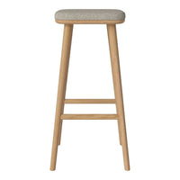 Natural wood bar stool with light beige fabric seat, featuring a simple and modern design.