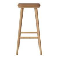 Light wood bar stool with a smooth tan cushioned seat, showcasing a minimalist design and natural finish.