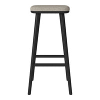 Black bar stool with a neutral beige cushion, featuring a simple solid pattern for a modern look.