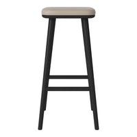 Black wooden bar stool with a soft beige seat, minimalist design, and no visible patterns. Ideal for modern decor.