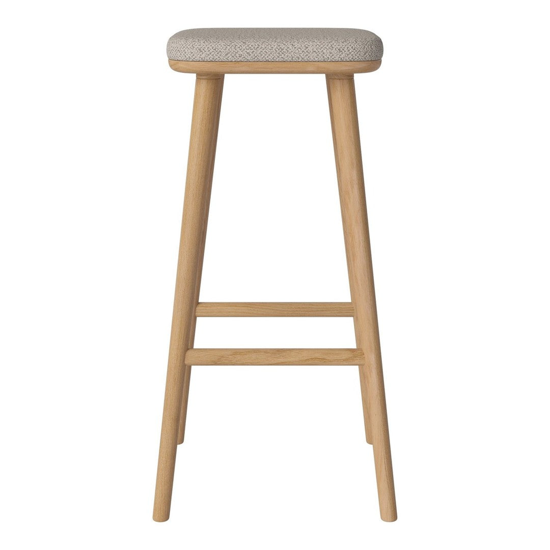 Light beige upholstered stool with natural wood legs, featuring a simple, modern design and subtle texture.