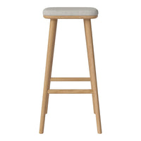 Light beige cushioned seat with natural wood legs in a minimalist design. Perfect for modern decor.
