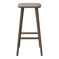 Beige upholstered stool with a natural wood finish, featuring a simple and modern design. Perfect for any setting.