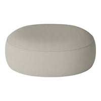 Light beige round pouf with a smooth, muted surface texture, perfect for minimalist decor.