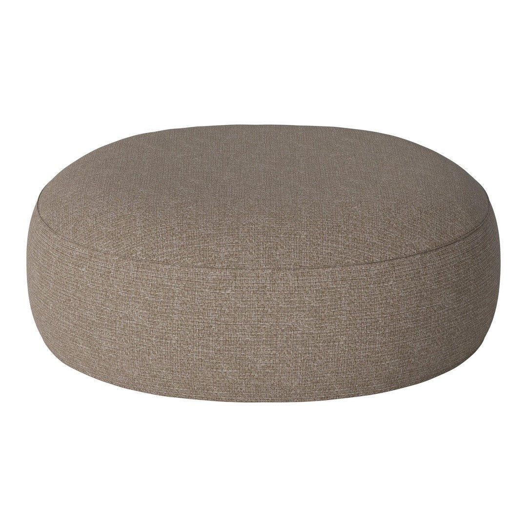 Round pouf in a warm taupe color with a subtle woven texture, perfect for versatile home decor.