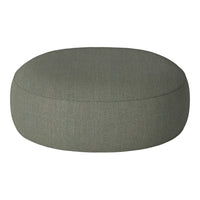 Round olive green pouf with a textured fabric surface, perfect for versatile home styling.