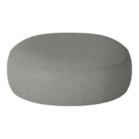 Round gray pouf with a smooth, textured fabric surface, perfect for modern decor styling.