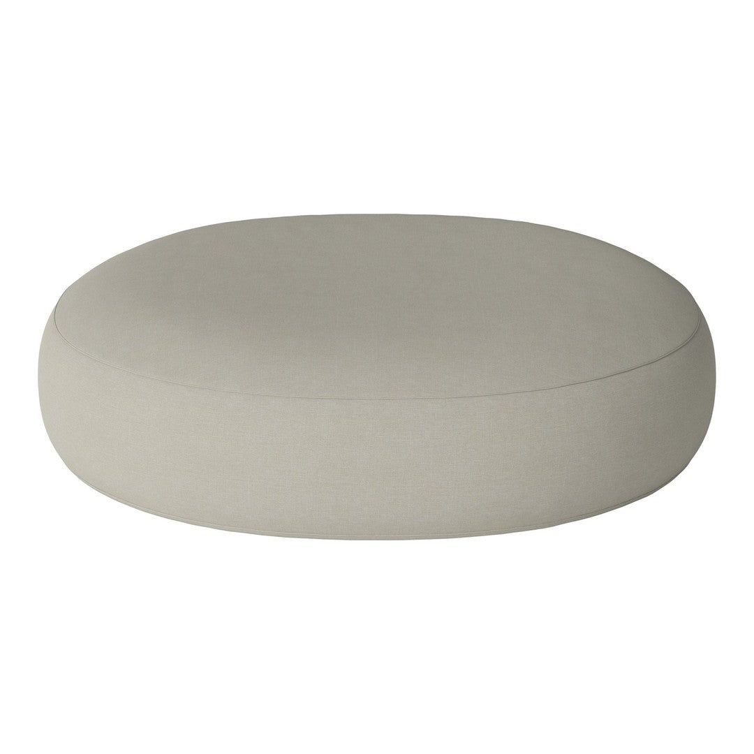 Beige oval pouf with a smooth, minimalist design, perfect for modern indoor decor.