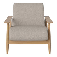 Light gray textured fabric armchair with natural wood legs and a minimalist design. Perfect for modern interiors.