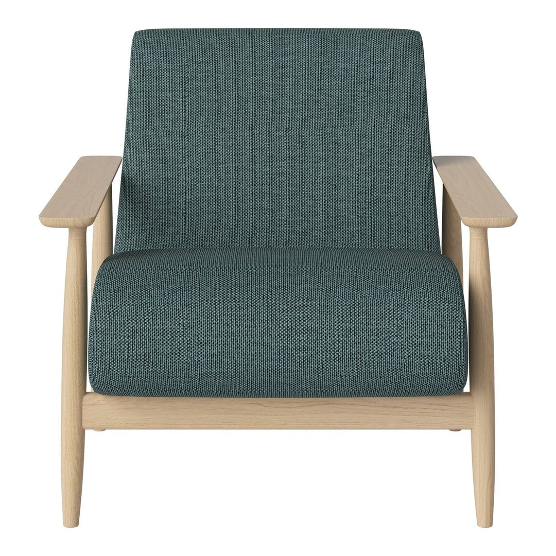 Teal upholstered armchair with a textured pattern and light wood frame, perfect for modern decor.