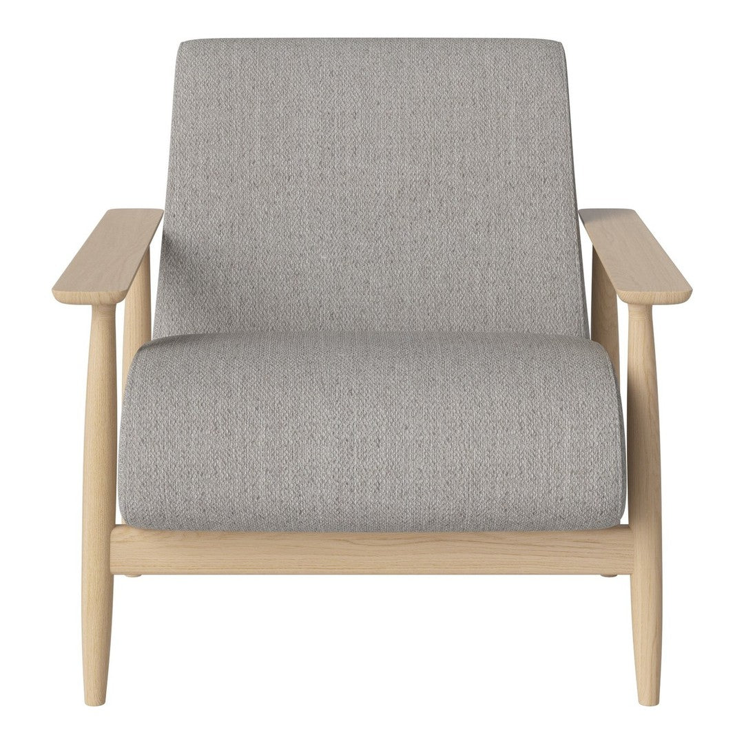 Gray textured fabric armchair with light wood arms and minimalist Scandinavian design. Perfect for modern decor.