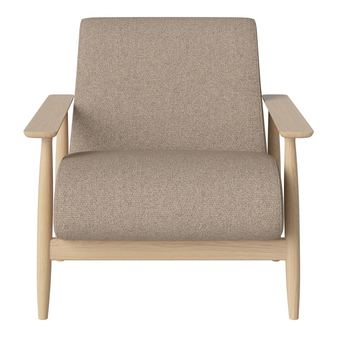 Beige upholstered armchair with a minimalist design and light wood frame, featuring smooth, soft fabric.