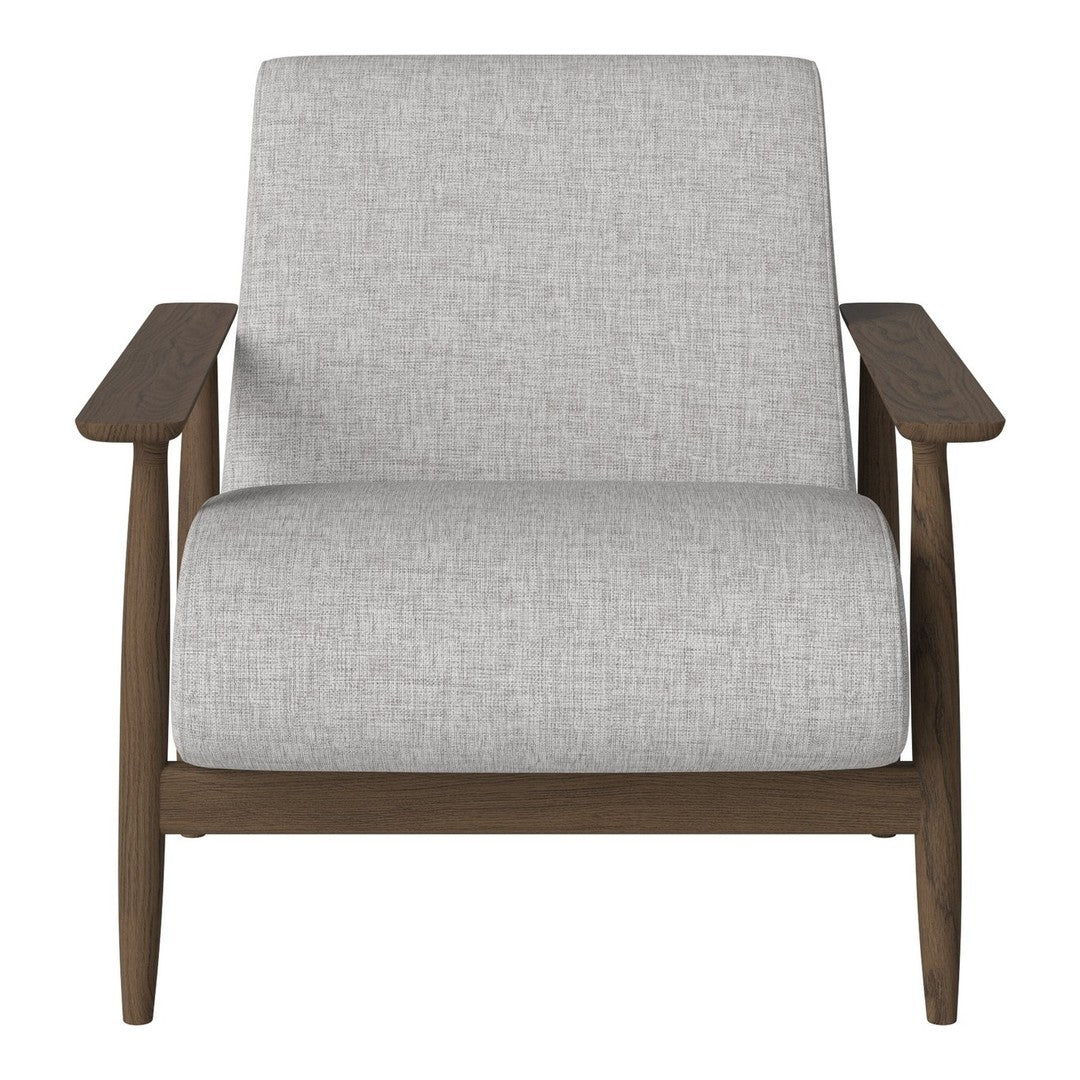 Gray upholstered armchair with a minimalist design and natural wood frame, perfect for a modern living space.