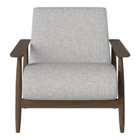 Gray upholstered armchair with a minimalist design and natural wood frame, perfect for a modern living space.