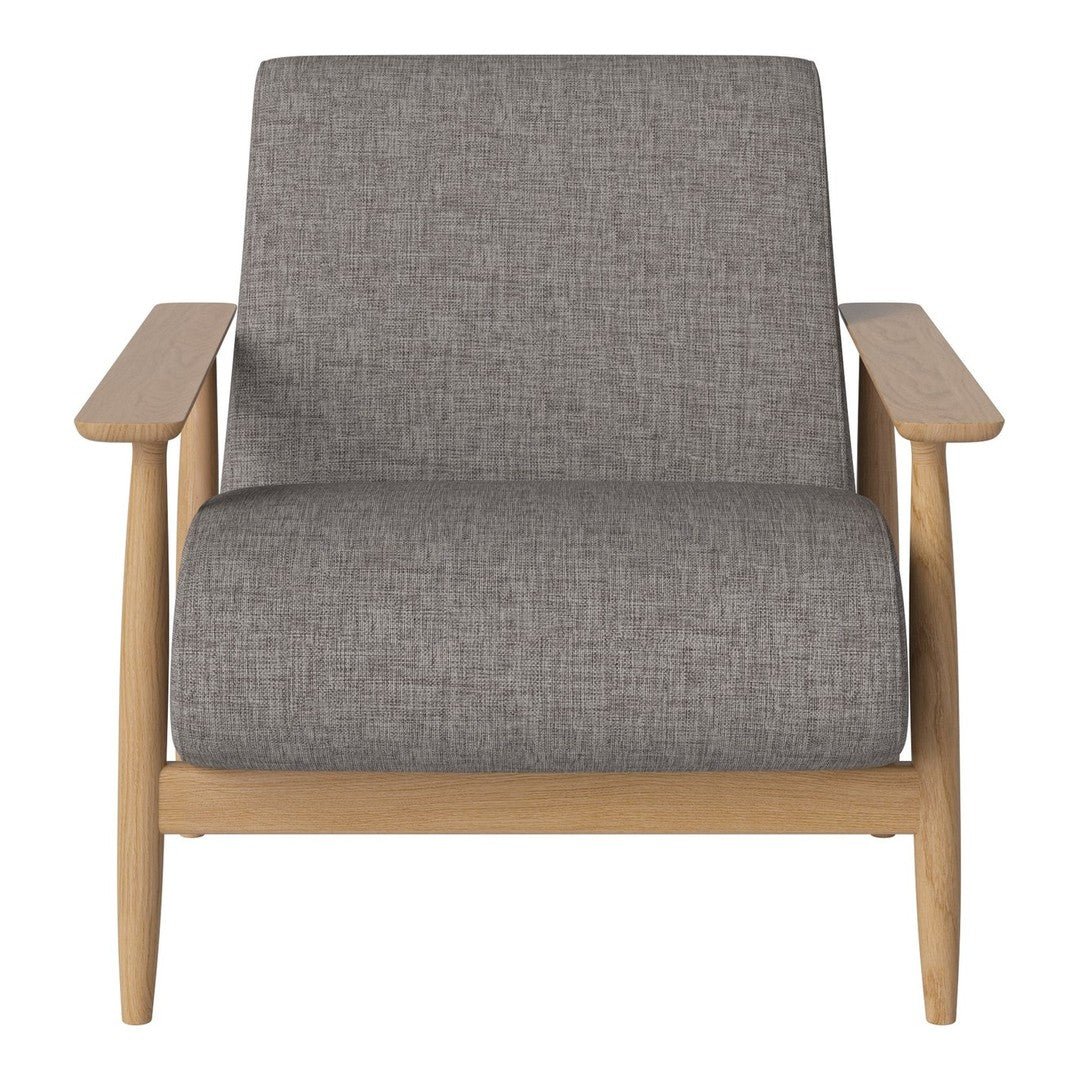 Gray textured upholstery on a modern armchair with natural wood armrests and legs. Simple, elegant design.
