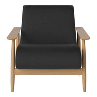 Black upholstered armchair with a sleek wooden frame, showcasing a minimalist design and contemporary style.