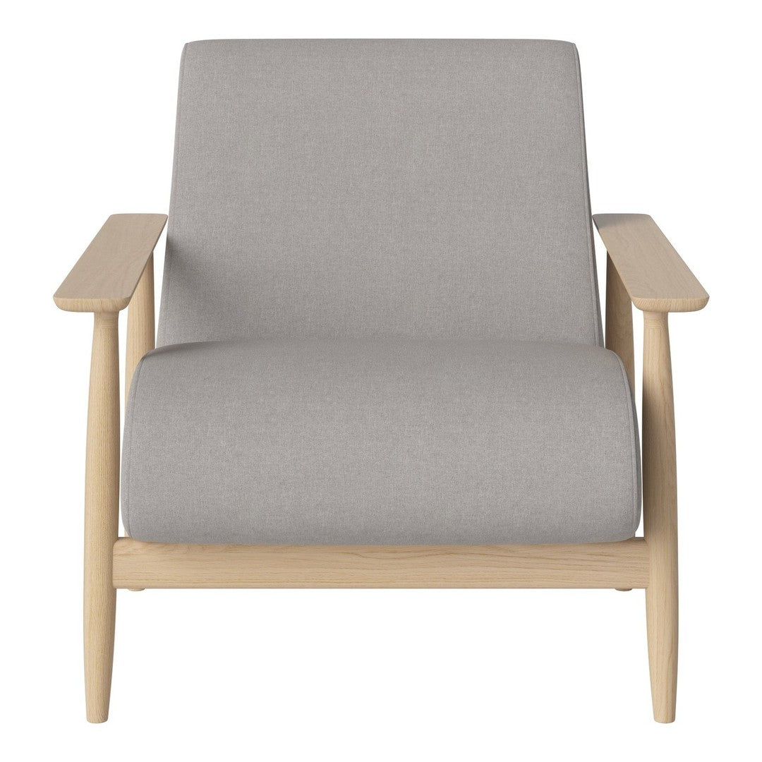 Gray upholstered armchair with a light wooden frame, featuring a minimalist design. Suitable for modern decor.