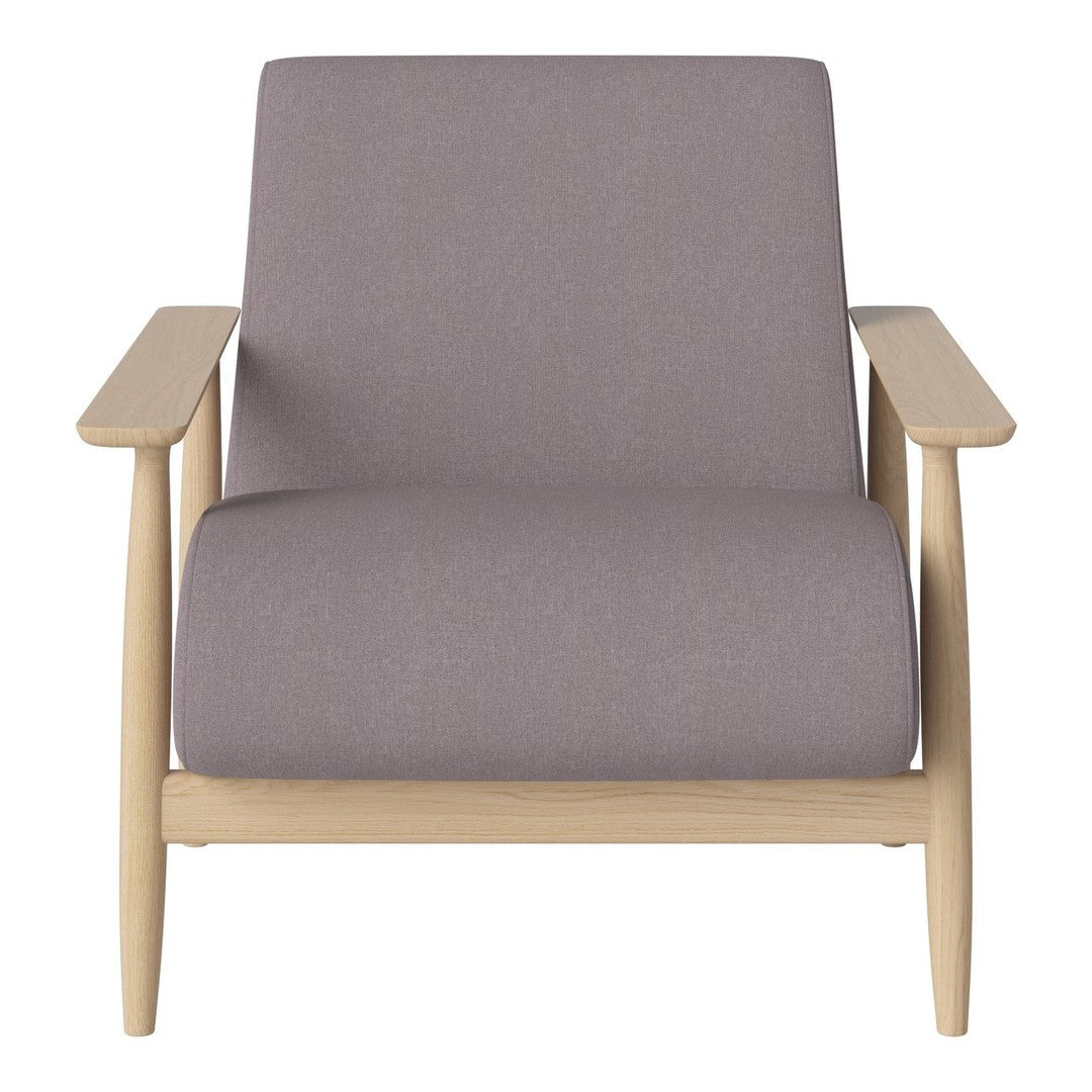 Light grey, minimalist armchair with natural wood legs, showcasing a modern, elegant design.