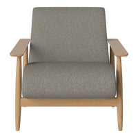 Gray upholstered armchair with a minimalist design and light wood frame. Modern style for any living space.