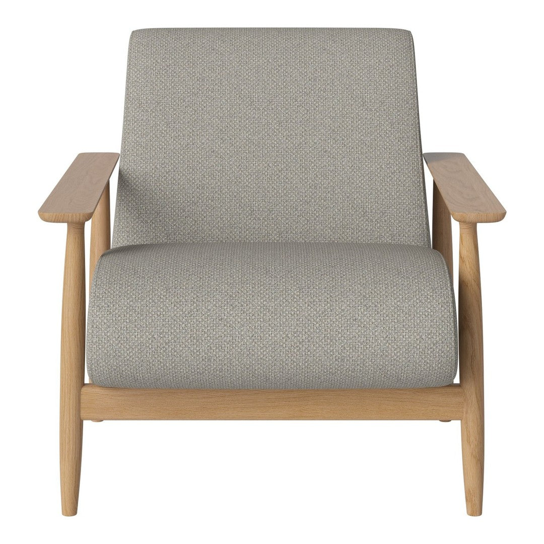 Gray upholstered armchair with a smooth texture and light wood legs, featuring a minimalist design.