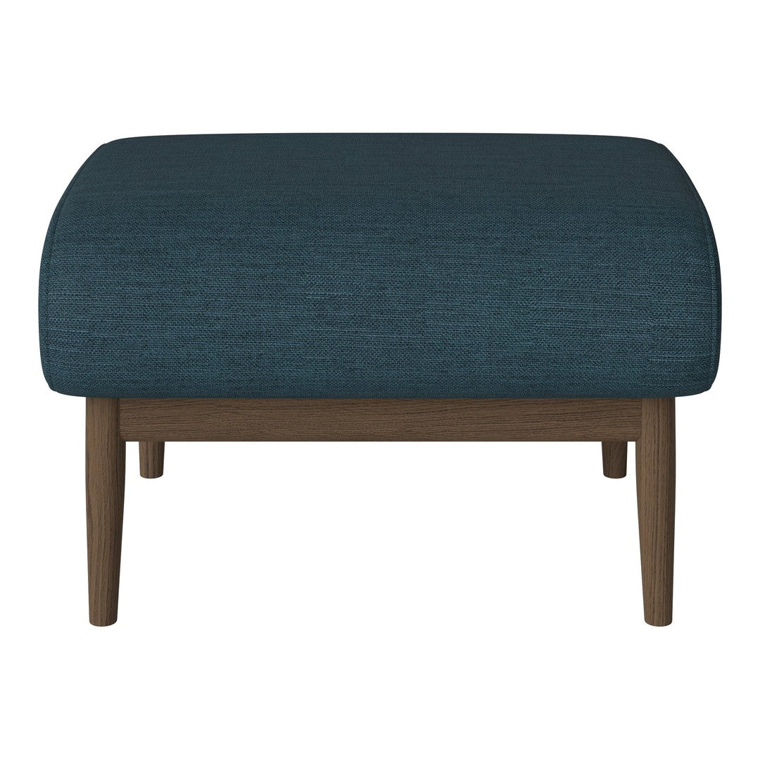 Teal upholstered ottoman with a textured pattern, featuring sturdy wooden legs in a natural finish.