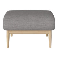 Gray upholstered ottoman with a smooth texture and natural wood legs, perfect for modern decor.