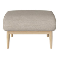 Beige upholstered ottoman with natural wood legs, featuring a smooth, minimalist pattern. Perfect for modern spaces.