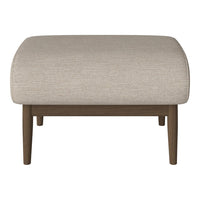 Beige upholstered ottoman with a smooth texture and dark wood legs, blending modern simplicity with cozy elegance.