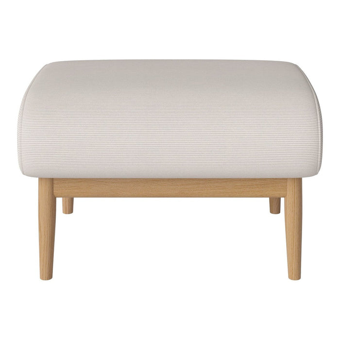 Light beige upholstered ottoman with smooth texture and natural wood legs. Simple, modern design for versatile decor.