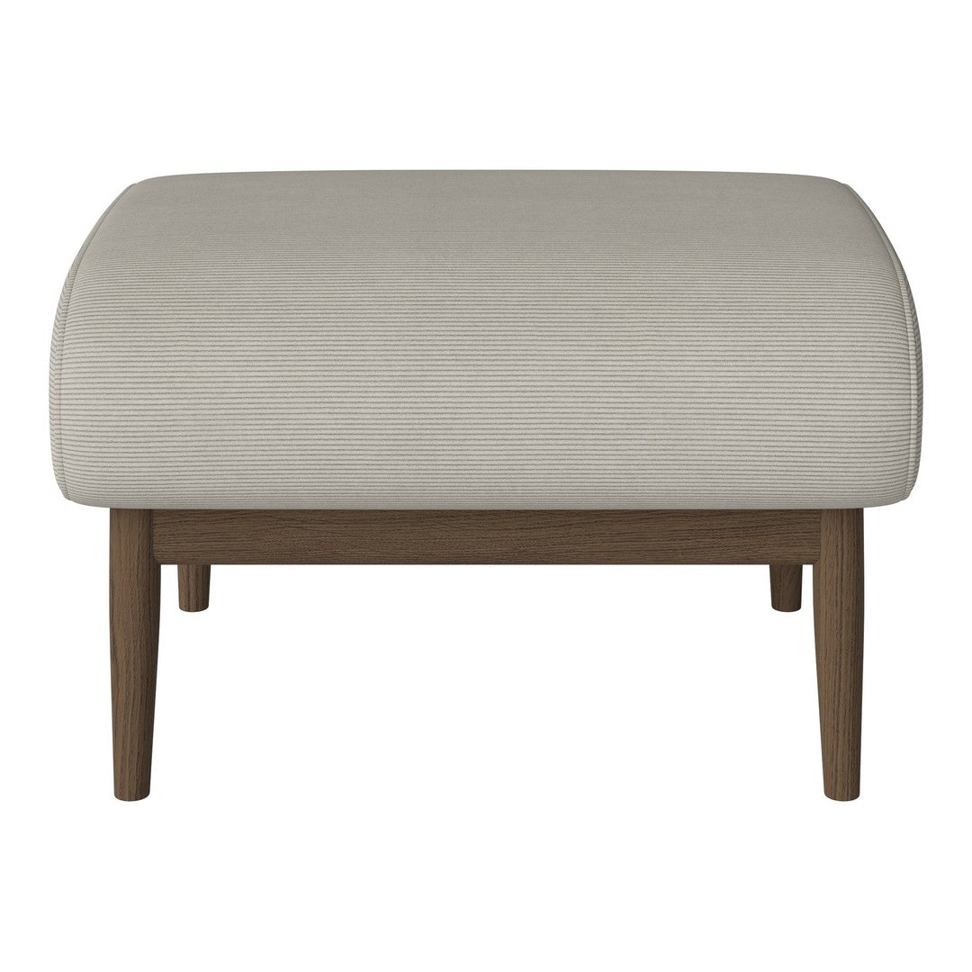 Beige fabric ottoman with a smooth texture and wooden legs, perfect for modern decor.