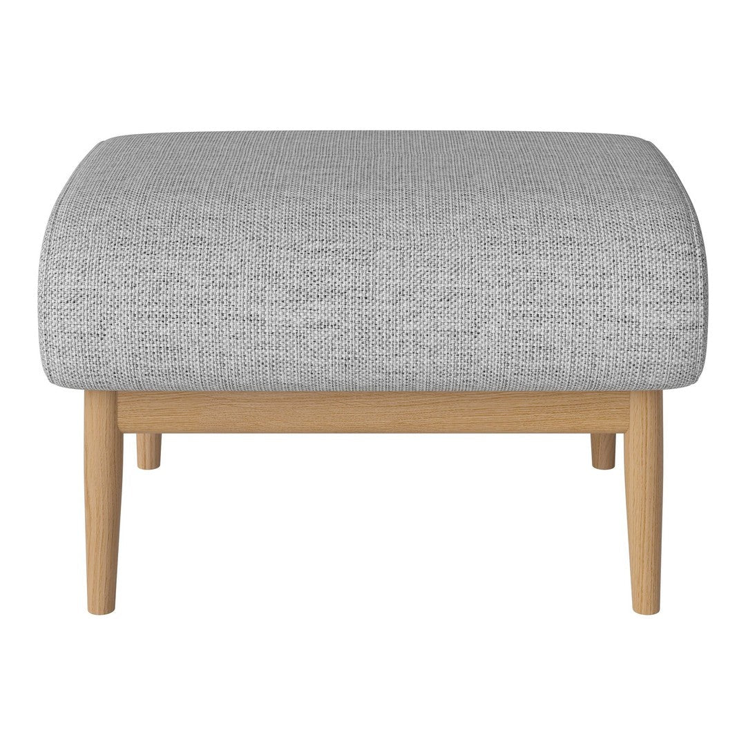 Grey upholstered ottoman with a textured pattern and light wooden legs. Simple, modern design for versatile decor.