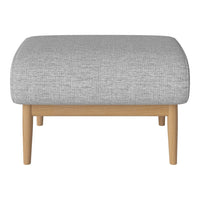 Grey upholstered ottoman with a textured pattern and light wooden legs. Simple, modern design for versatile decor.