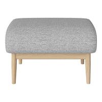 Gray textured upholstery on a modern ottoman with light wooden legs. Ideal for contemporary decor.