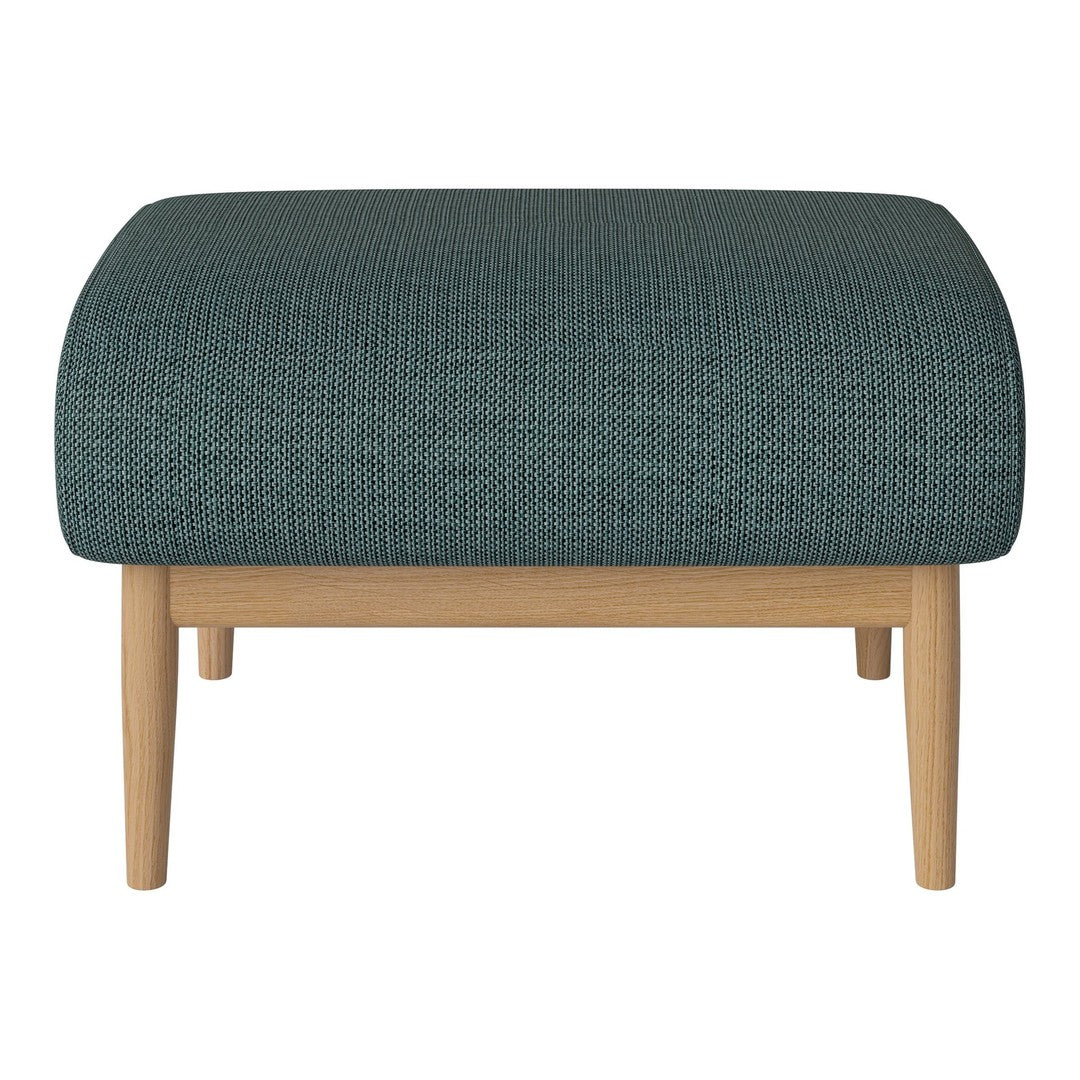 Teal patterned ottoman with natural wood legs, perfect for stylish and modern home decor.