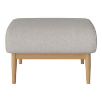 Light gray ottoman with a textured fabric finish and natural wood legs, featuring a simple, modern design.