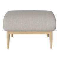 Light gray upholstered ottoman with smooth texture and natural wooden legs, showcasing a minimalist design.