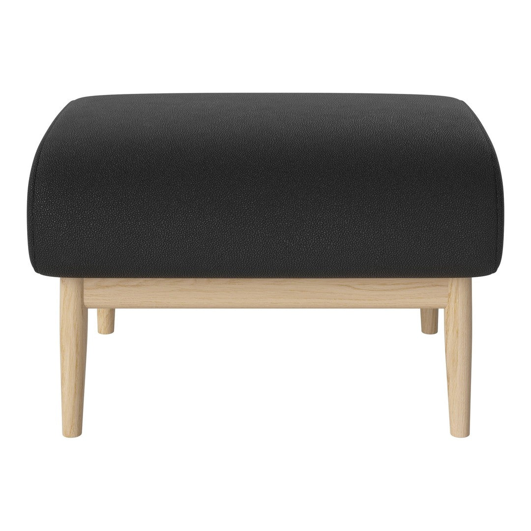 Black upholstered ottoman with smooth texture and natural wood legs. Modern, minimalist design for stylish decor.