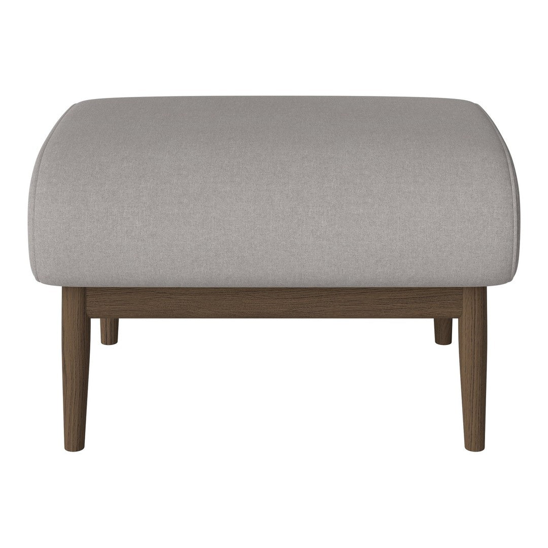 Gray upholstered ottoman with a smooth surface and wooden legs. Minimalist design perfect for modern decor.