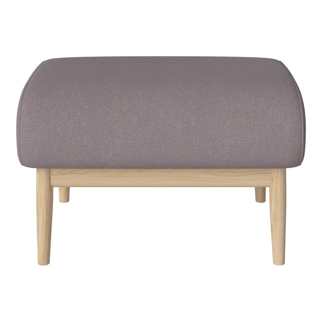 Soft purple upholstered ottoman with curved top and light wood legs, perfect for modern decor.