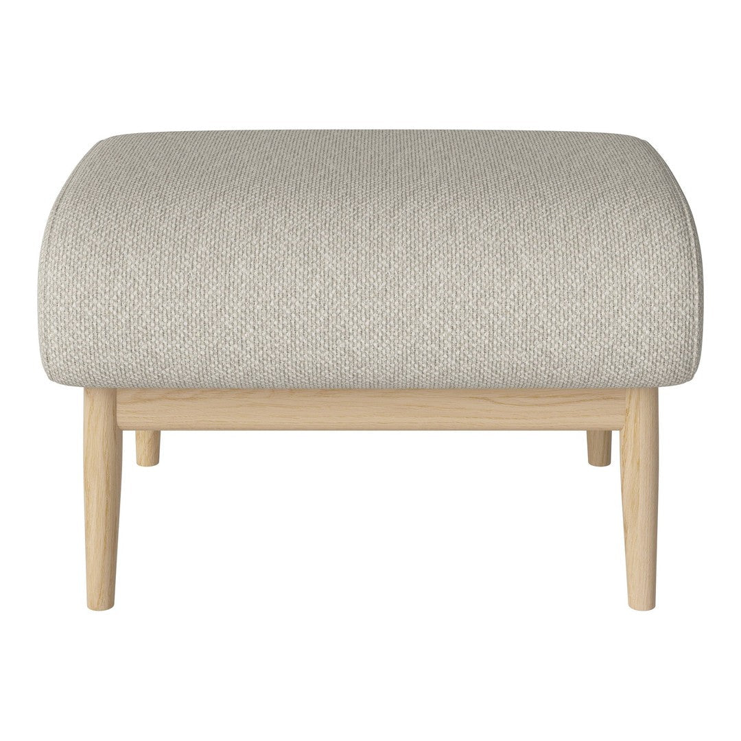 Light gray upholstered ottoman with a soft texture and natural wooden legs, enhancing modern decor.