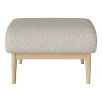 Light gray upholstered ottoman with a soft texture and natural wooden legs, enhancing modern decor.