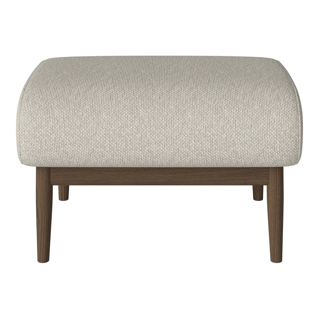 Cream upholstered ottoman with textured pattern and dark wood legs. Ideal for modern or minimalist decor.