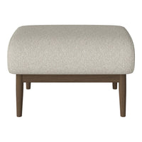 Cream upholstered ottoman with textured pattern and dark wood legs. Ideal for modern or minimalist decor.