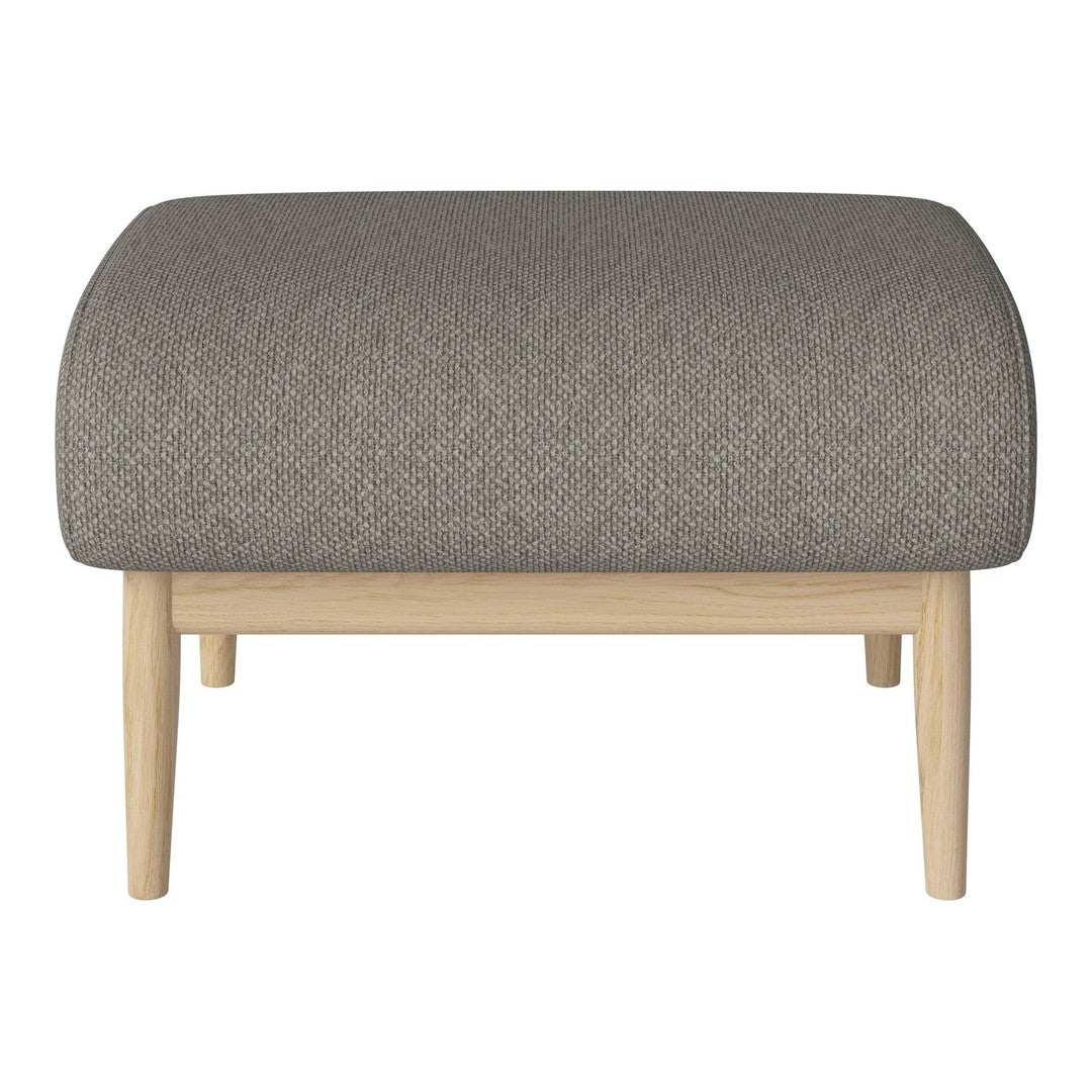 Gray upholstered ottoman with a textured pattern and light wooden legs, adding modern elegance to any space.
