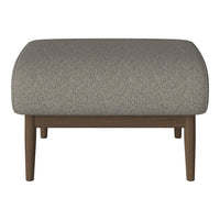 Gray upholstered ottoman with a subtle textured pattern and wooden legs, perfect for modern decor.